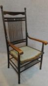 A late 19th century beech American style stick back armchair. H.83cm