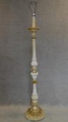 A white painted and gilt French style standard lamp. H.175cm