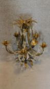 A brass and crystal ceiling chandelier of naturalistic form. 65x53cm