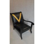 An embossed leather armchair by Vanashree Singh. H.81cm