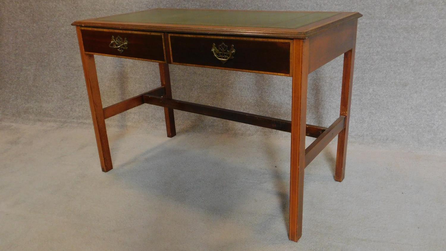 A Sheraton style mahogany and inlaid two drawer writing table on reeded square section stretchered - Image 4 of 7