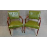 A pair of vintage green leather upholstered mahogany framed armchairs. H.88cm