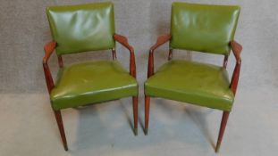 A pair of vintage green leather upholstered mahogany framed armchairs. H.88cm