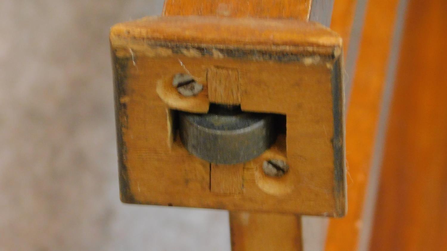 A vintage Frister and Rossman sewing machine in a fitted walnut side table. 80x70x50cm - Image 9 of 9