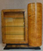 A Continental Art Deco burr walnut display cabinet with cupboard to side enclosed by a demi lune