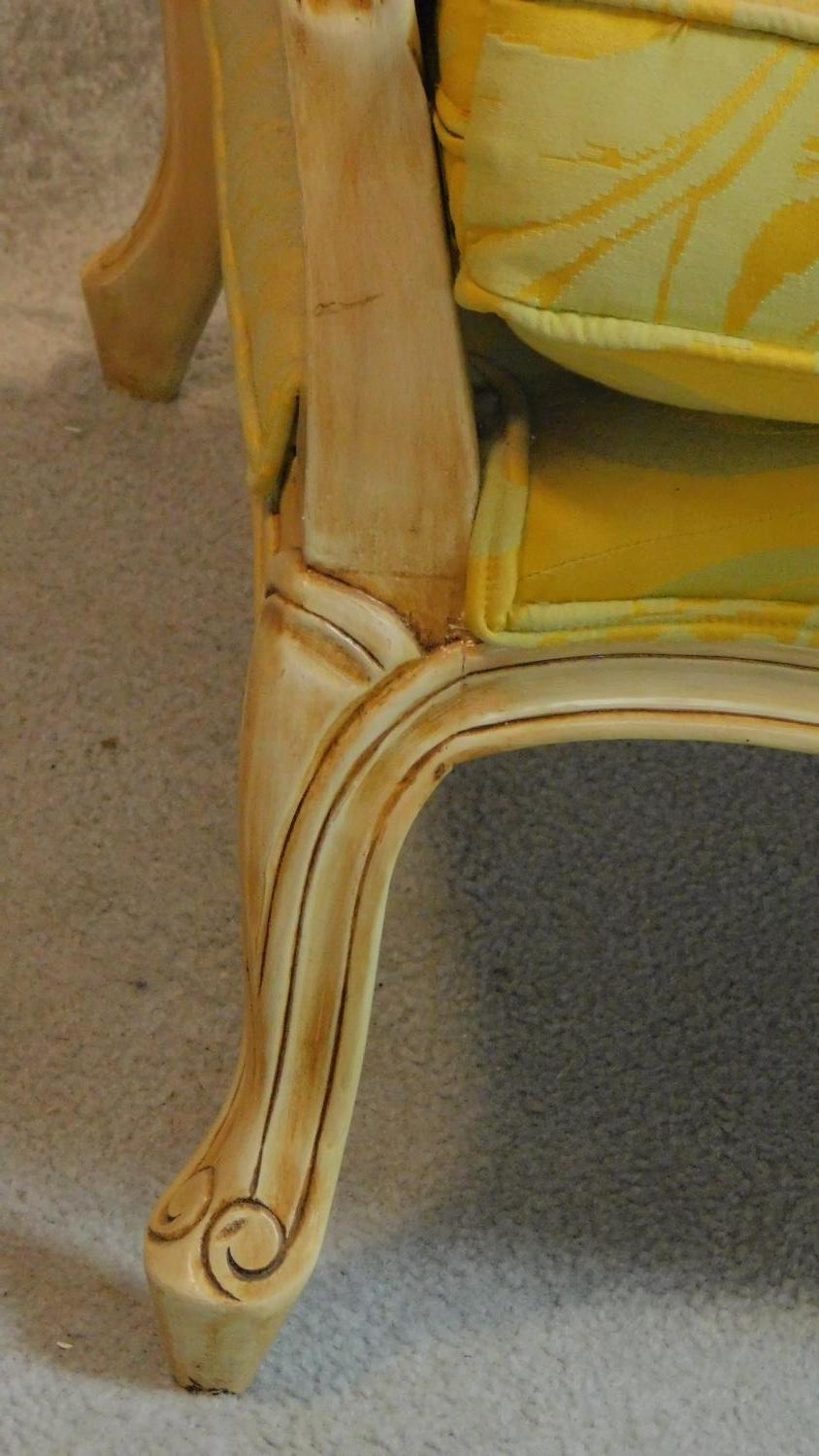 A pair of French style fauteuil with distressed painted frames in lemon floral upholstery. H.102cm - Image 6 of 8