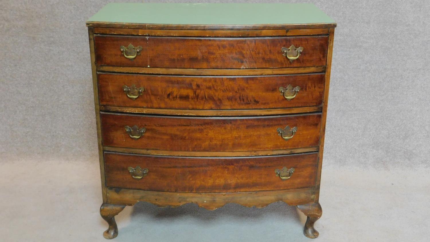 A mid 20th century mahogany Georgian style bowfront chest of drawers. H.84 W.83 D.46cm
