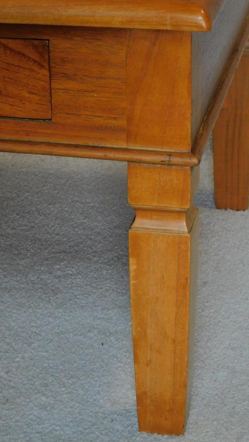 An Eastern teak low table fitted frieze drawers. 46x124x63cm - Image 4 of 5