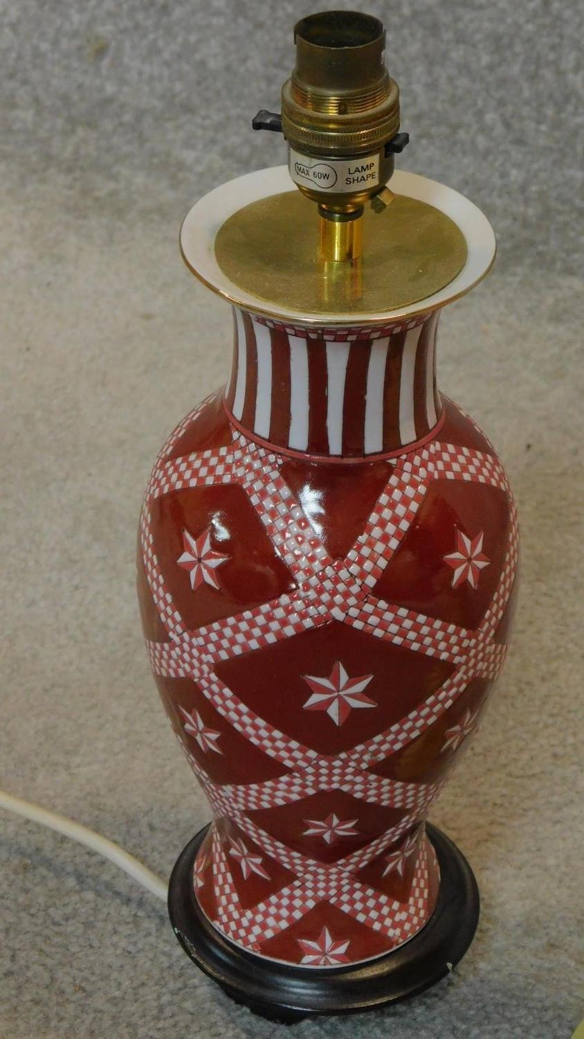 A baluster form table lamp and a pair of onyx candlesticks. H.35cm - Image 2 of 5