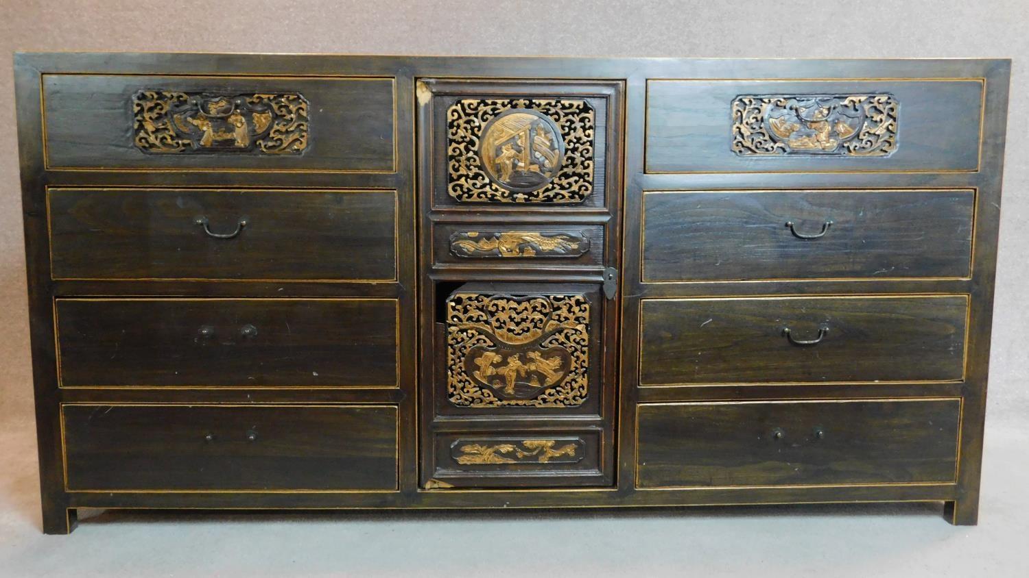 A lacquered and carved Chinese sideboard fitted central cupboard flanked by drawers. 90x180x45cm - Image 2 of 10