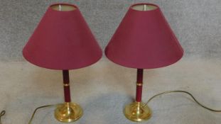 A pair of brass table lamps. H.50cm