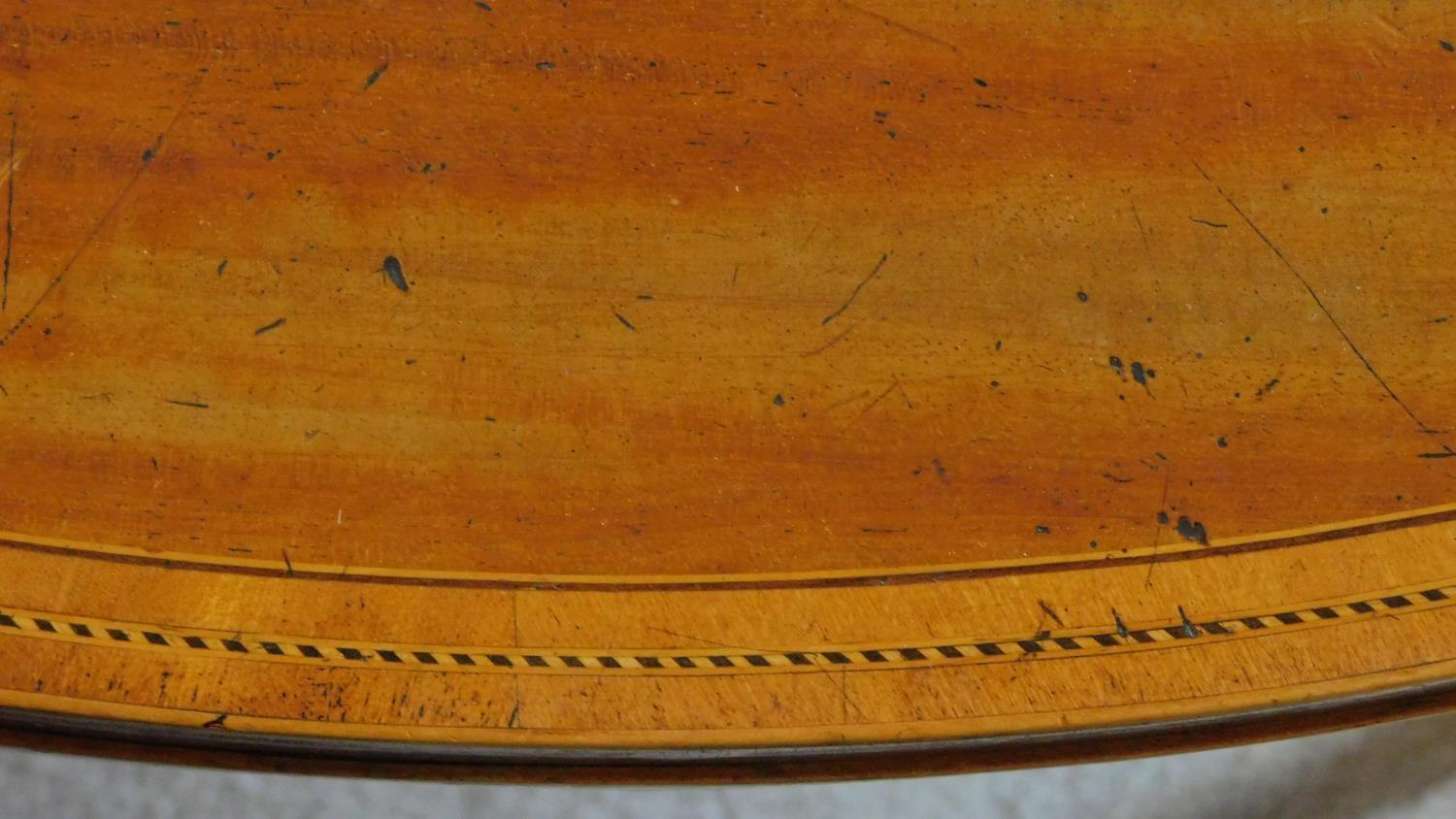 A Georgian mahogany and satinwood strung demi lune foldover top card table on square tapering - Image 6 of 8