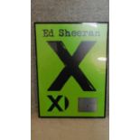 A framed and glazed presentation plaque, Ed Sheeran 'X' album. 61x44cm