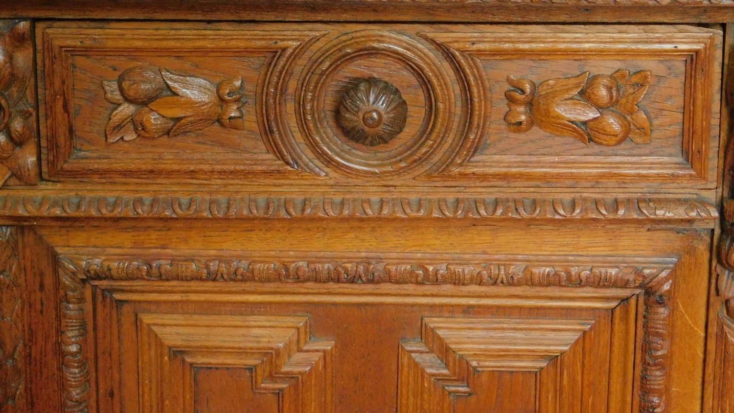 A 19th century Flemish style oak carved cabinet fitted doors and drawers. 100x155x44cm - Image 8 of 11