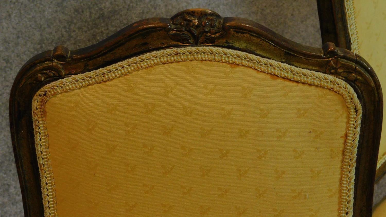 A set of six 19th century gilt framed lemon upholstered dining chairs on carved cabriole supports. - Image 5 of 7