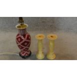 A baluster form table lamp and a pair of onyx candlesticks. H.35cm