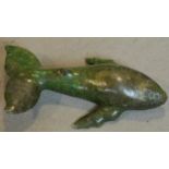 A carved soapstone figure of a whale, inscribed. W.41cm