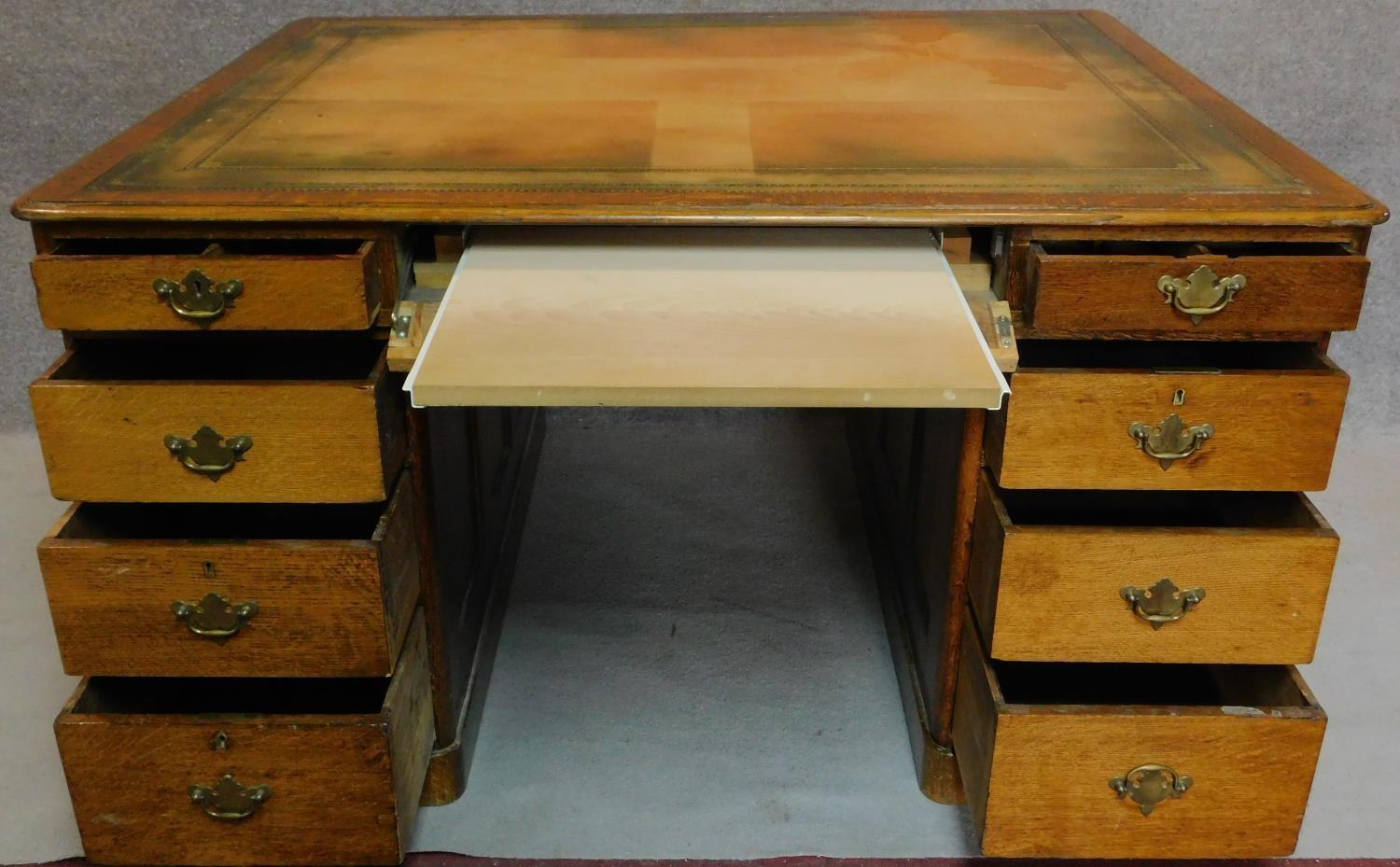 A Victorian oak partners desk with original tooled leather top above frieze drawers and pedestal - Image 5 of 8