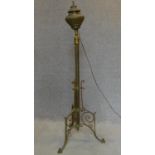 A 19th century brass floor standing oil lamp converted to electricity. H.140cm