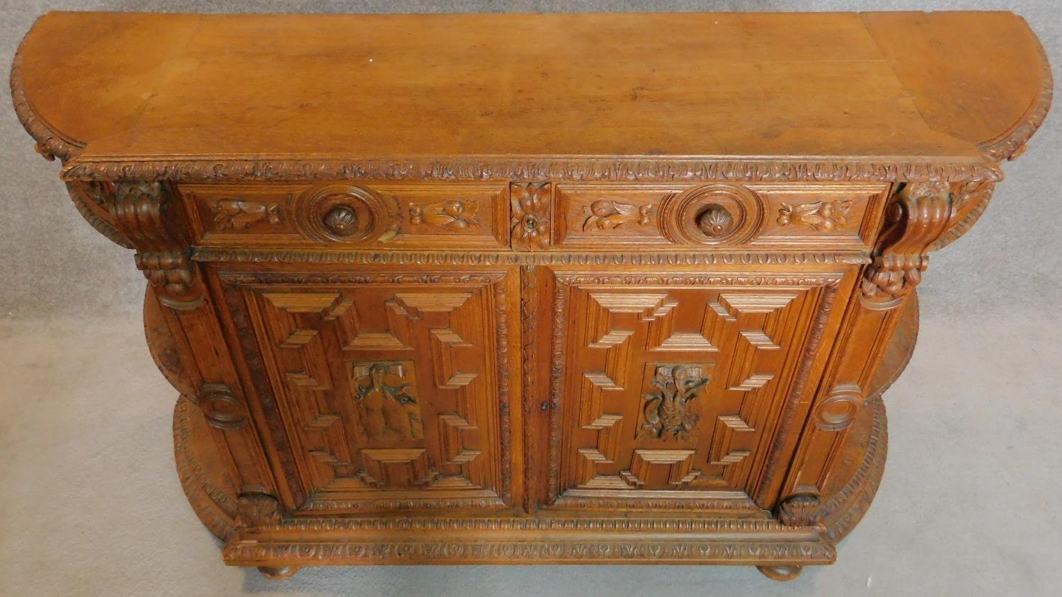 A 19th century Flemish style oak carved cabinet fitted doors and drawers. 100x155x44cm - Image 10 of 11