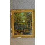 A 19th century gilt framed oil on board, figure at a gate in a woodland setting. 46x39cm