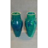 A large pair of green drip glazed sharab wine vessels. H.89cm