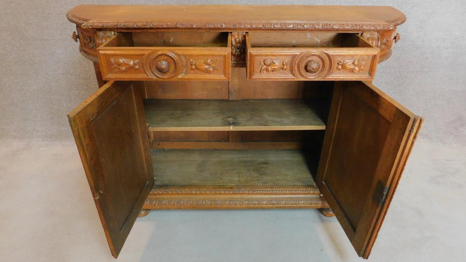 A 19th century Flemish style oak carved cabinet fitted doors and drawers. 100x155x44cm - Image 2 of 11