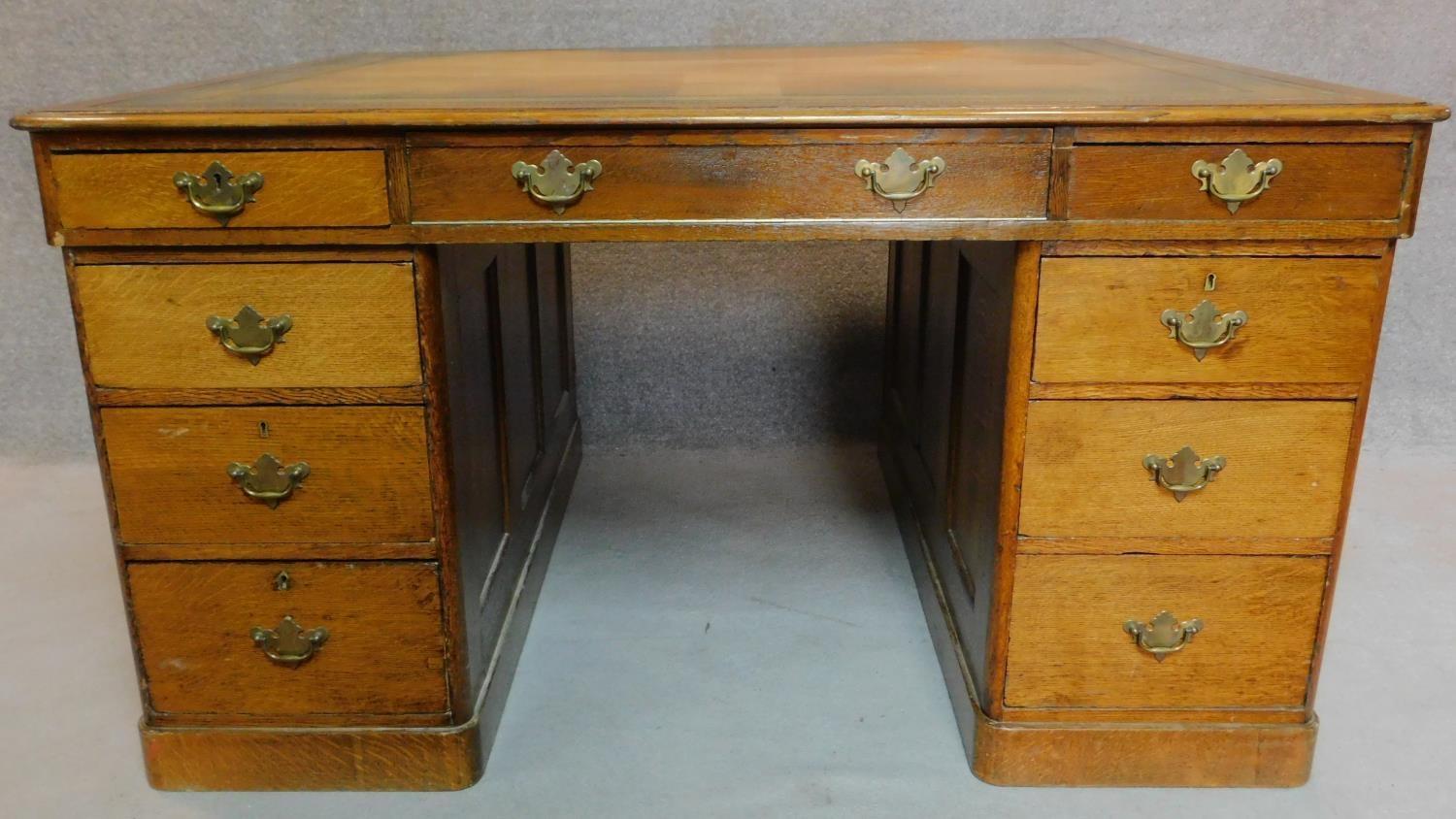 A Victorian oak partners desk with original tooled leather top above frieze drawers and pedestal - Image 4 of 8