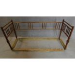 A Regency mahogany faux bamboo style child's bed. 82x176x60cm (A/F with parts missing)