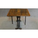 An Edwardian inlaid drop flap Sutherland table. H.64 W.56 D.55cm