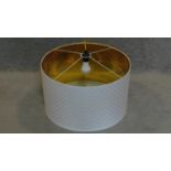 A white cylindrical pendant lamp shade and fitting. 35x60x60cm