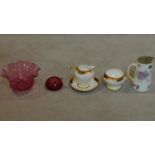 A Thomas Goode milk jug and bowl, another Victorian jug and two pieces of Cranberry glass.