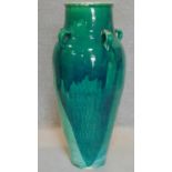 A large green drip glazed sharab wine vessel. H.94cm