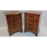 A pair of Georgian style mahogany and boxwood strung small chests of four drawers. H.60 W.44 D.34cm