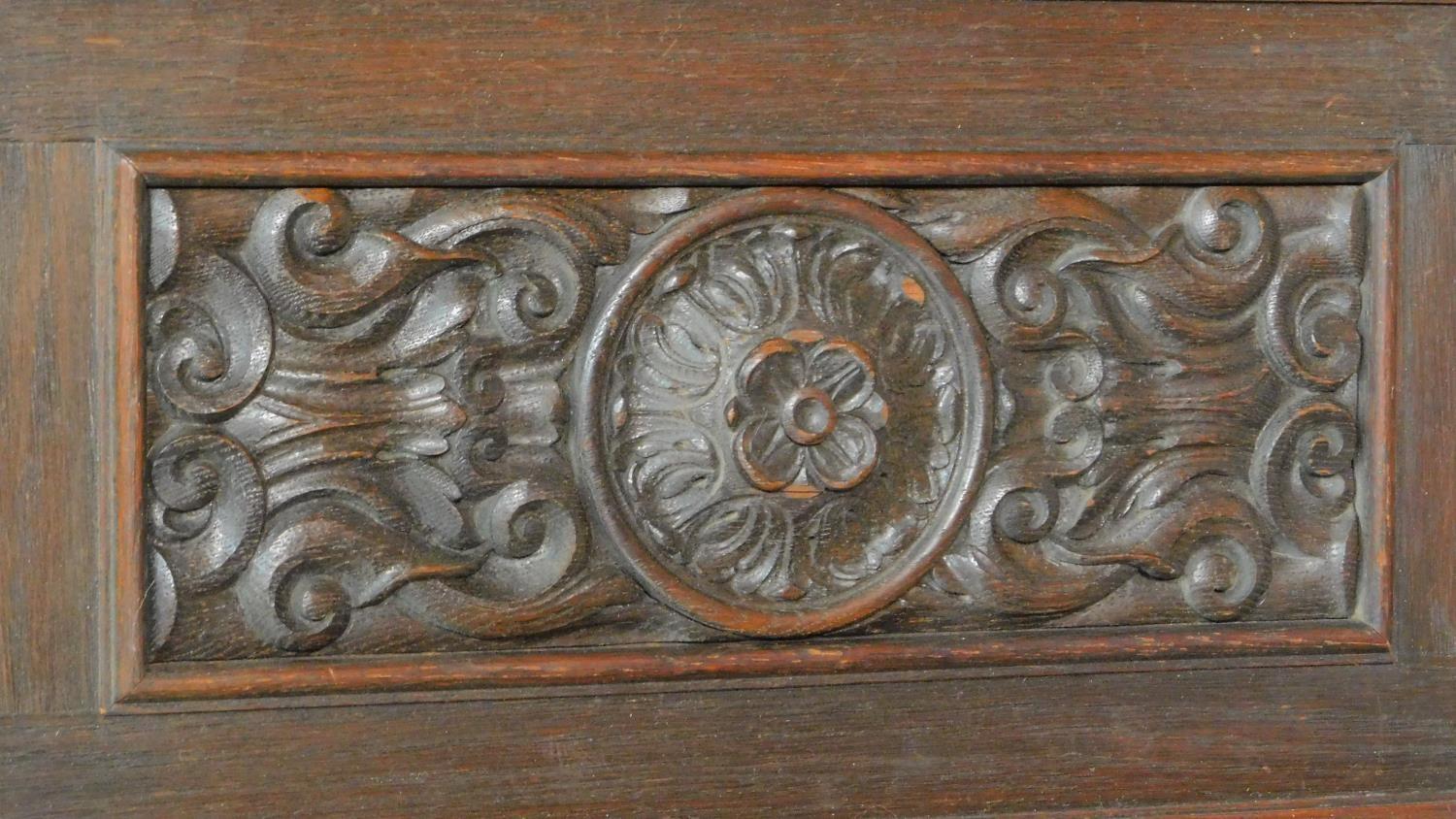 A continental oak and walnut kneehole desk fitted cupboards enclosing slides on reeded bun feet. H. - Image 5 of 7