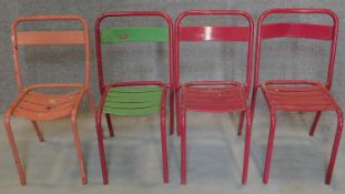 A set of four vintage tubular metal stacking chairs. H.81cm