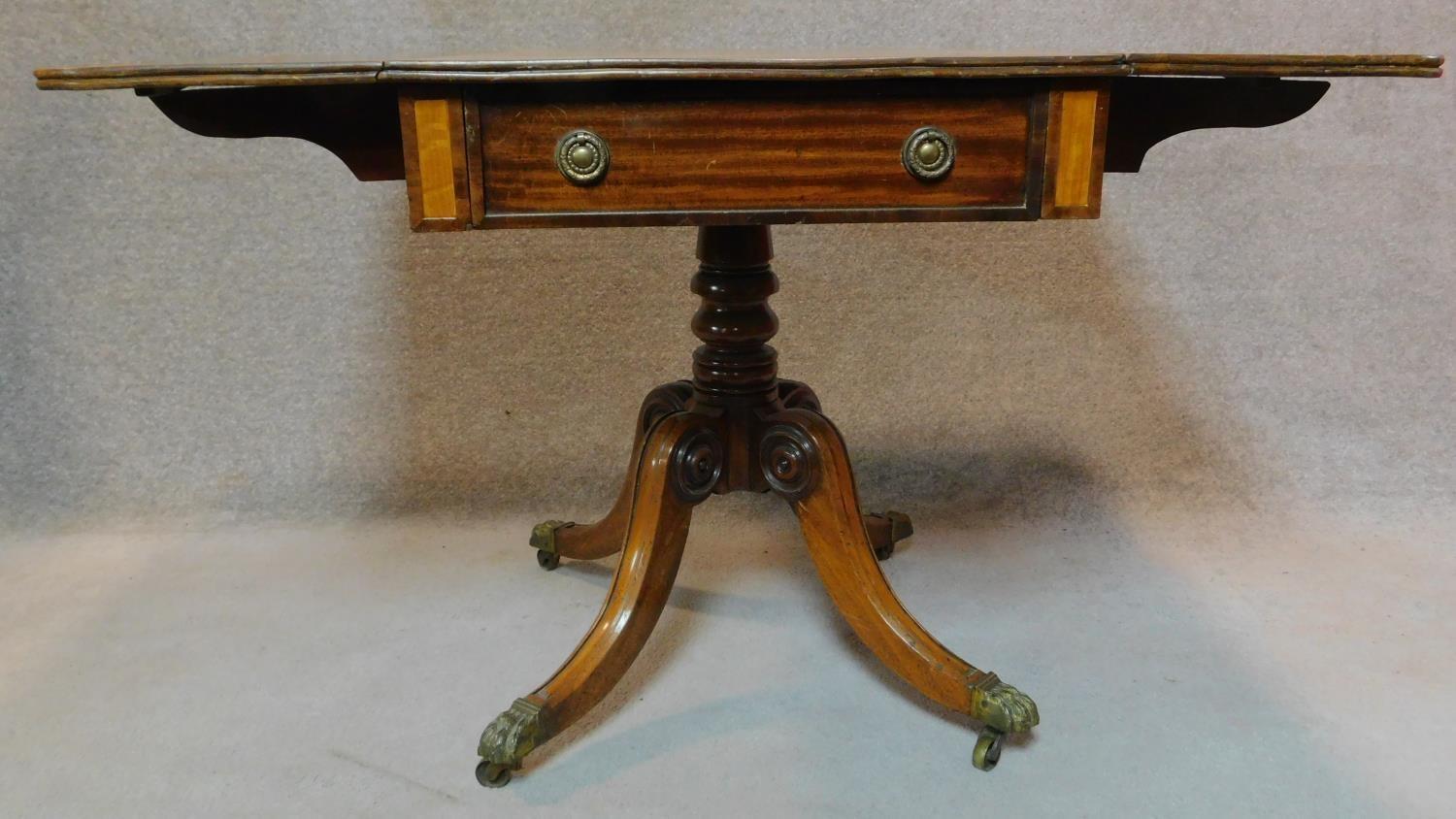 A Regency mahogany and satinwood crossbanded drop flap Pembroke table on carved quadruped cabriole - Image 4 of 8