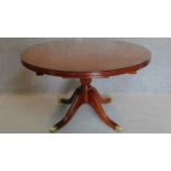 A Regency style mahogany extending dining table, makers mark to underside. H.73 W.180 D.120cm