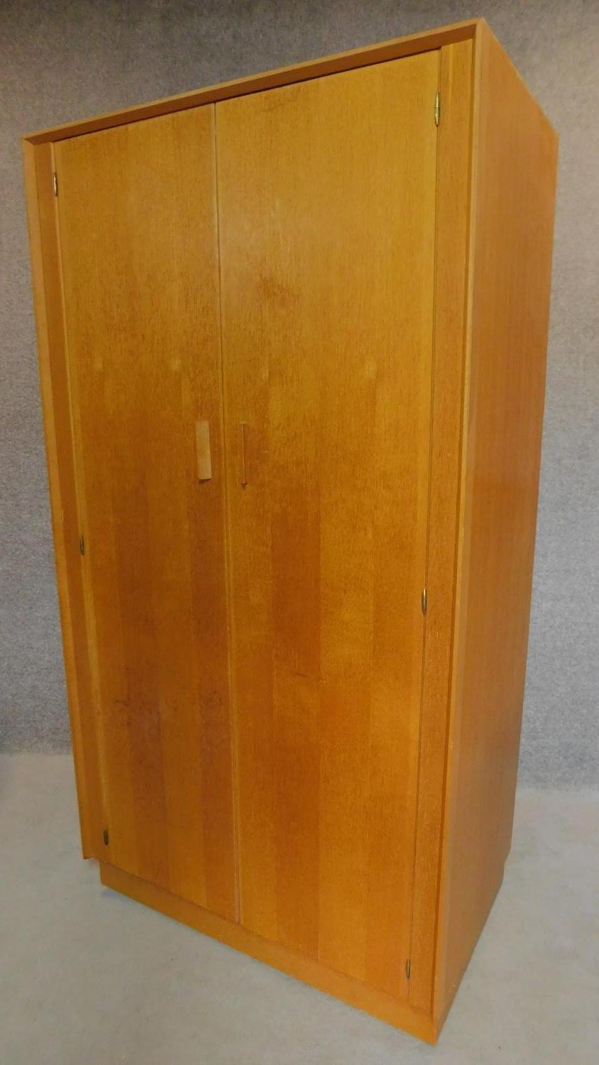 A fitted oak wardrobe by E. Gomme G-Plan, label to door. H.174 W.92 D.57cm - Image 5 of 7