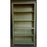 A painted full height open bookcase. 177x95x30cm