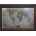 A large framed and glazed map of the world. 86x125