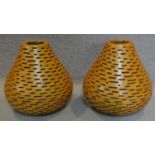A pair of lattice constructed wooden vases. H.45 (tallest)