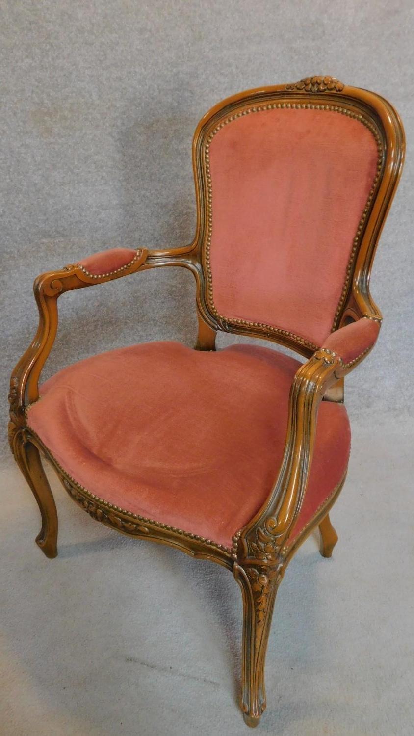 A pair of French carved beech framed open armchairs in blush upholstery on cabriole supports. H.96cm - Image 2 of 8