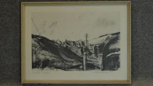 A framed and glazed artists's proof, Welsh mining village, signed David Carpanini. 67x50cm