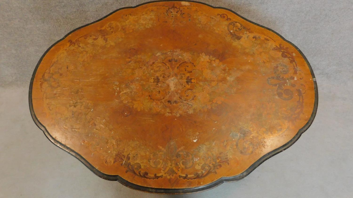 A late 19th century walnut and marquetry inlaid shaped top dining table on well carved quadruped - Image 5 of 11