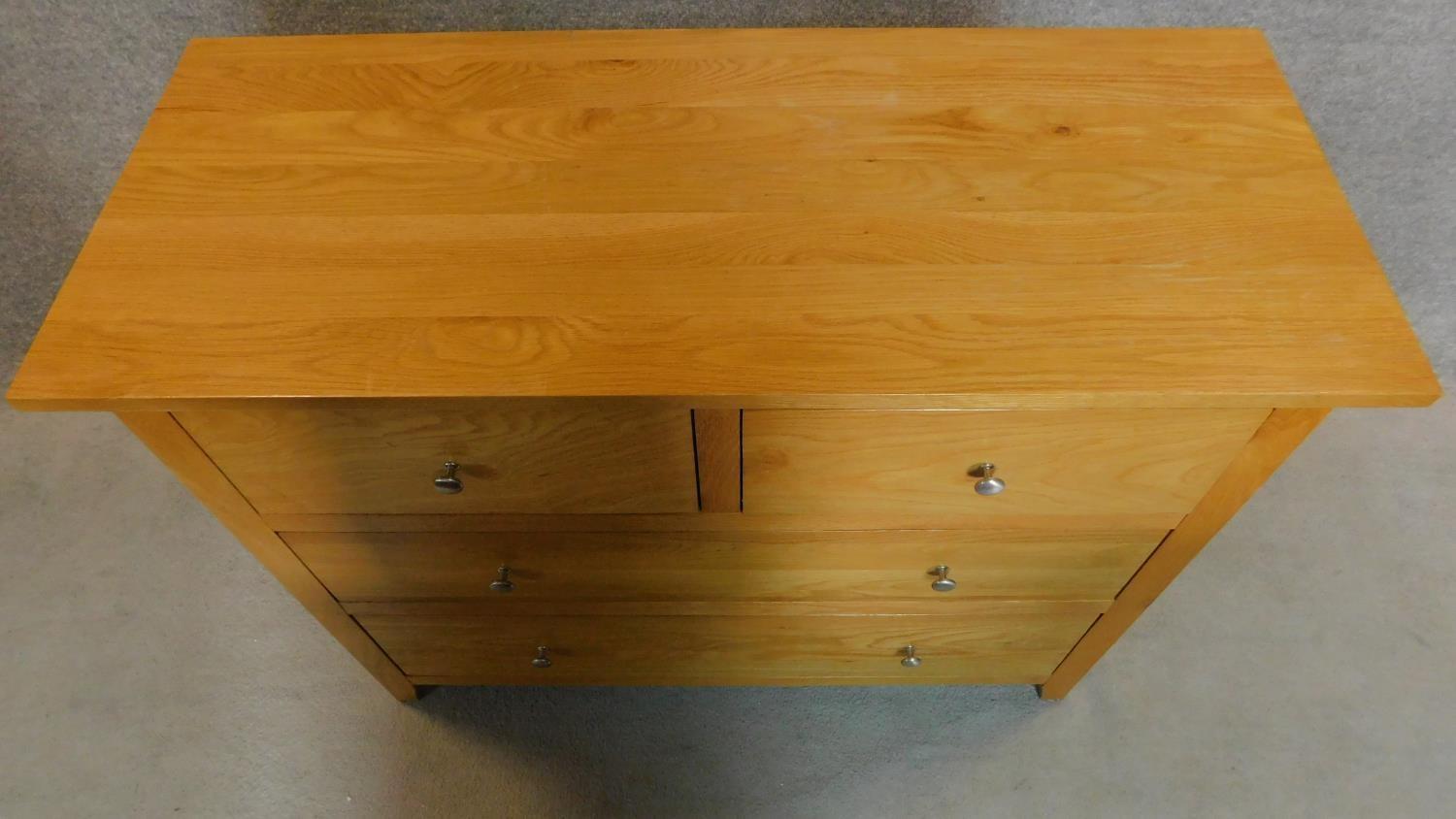 A contemporary oak chest of two short over two long drawers. H.93 W.116 D.48cm - Image 3 of 4