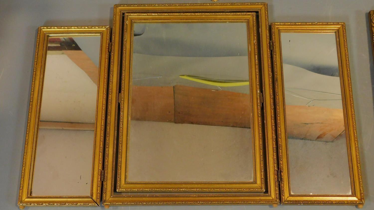 A gilt framed triptych dressing table mirror and three other gilt wall mirrors. 66x44cm (largest) - Image 4 of 5