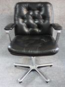 A black leather buttoned back swivel armchair on chrome base. H.91