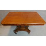 A Victorian mahogany tilt top breakfast table on platform base H.76 W.137 D.104cm