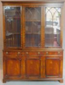 A Georgian style mahogany two section library bookcase, makers label. 195x150x40cm